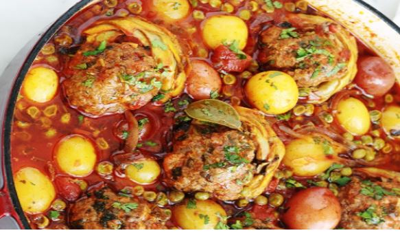 Recette : Artichauts farcis mijotés en sauce tomate